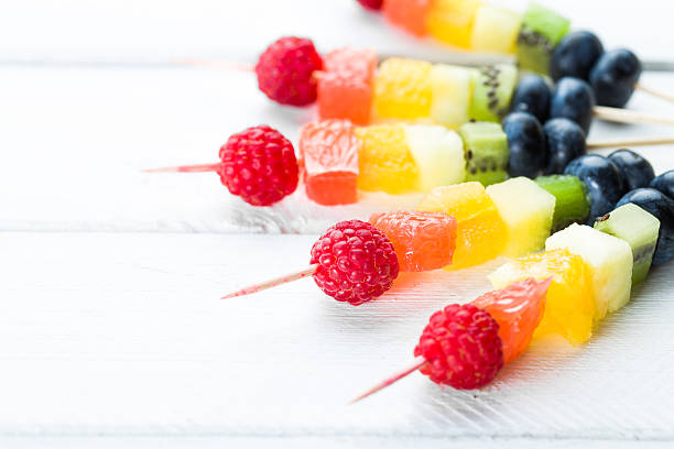 istock Fresh summer fruits on sticks 482120016