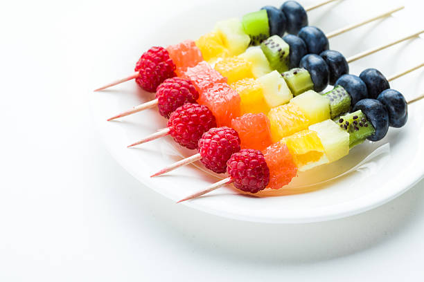 istock Fresh summer fruits on sticks 482120028