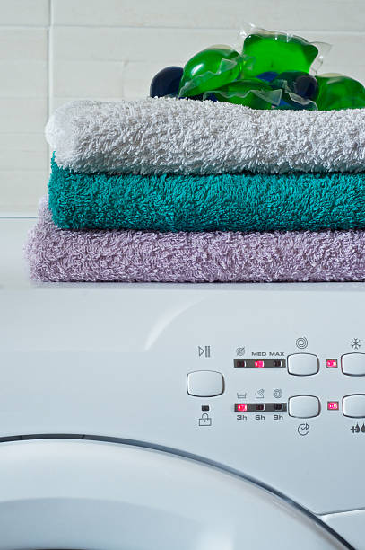 istock Capsule detergent on top of washing machine 482124065