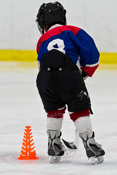istock Young hockey player at practice 482125169