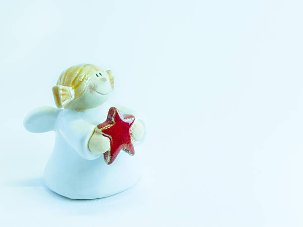 Cute Christmas angel holding star