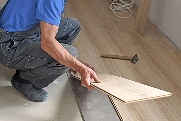 istock male carpenter puts the laminate 482131088