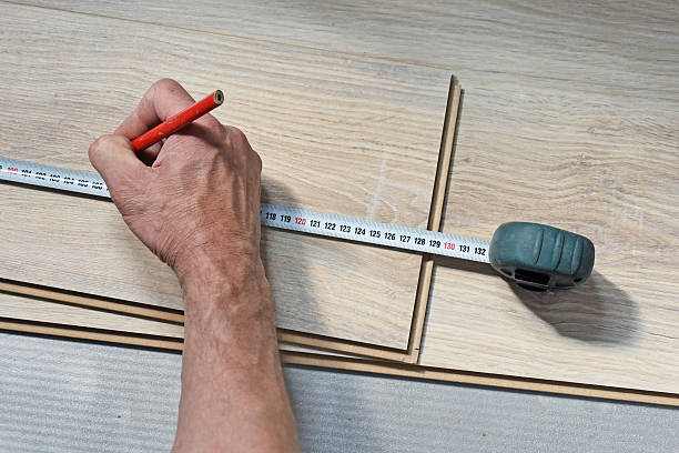 istock hands of a carpenter, mark a pencil 482131220