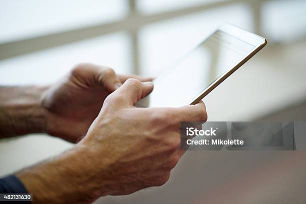 A World Of Information At Your Fingertips Stock Photo - Download Image Now - 2015, Adult, Adults Only