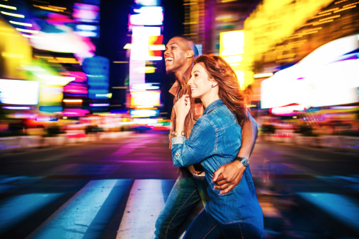 Couple in Times Square, New York, USA.