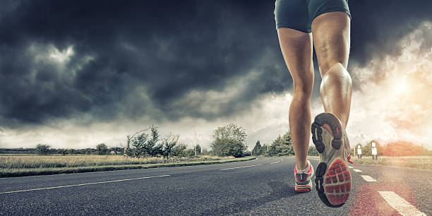 istock Rear View of Runners Legs 482132933