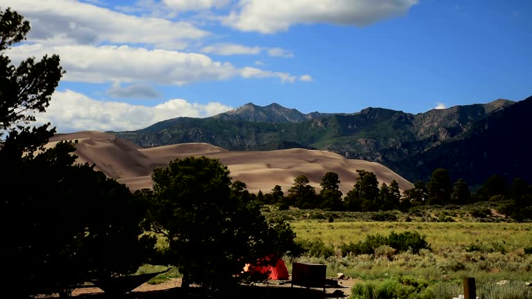 Southwest Colorado Great Sand Dunes National Park Timelapse Sangre De cristo mountains and clouds moving outdoor paradise camping