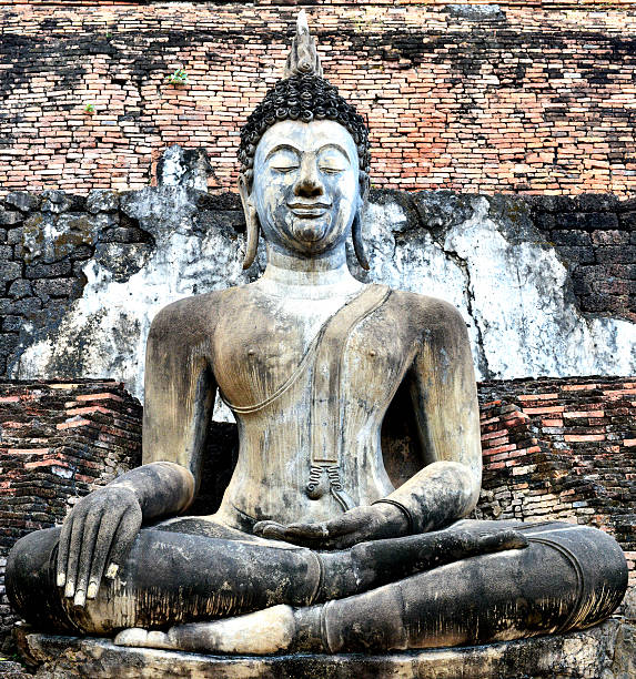 Old Buddha Statue at Wat Mahathat Temple in Sukhothai Historical park