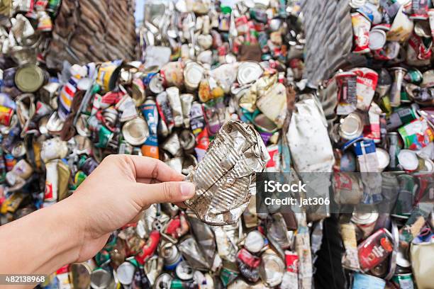 Hand Holding Aluminum Can For Recycle Stock Photo - Download Image Now - Can, Scrap Metal, 2015