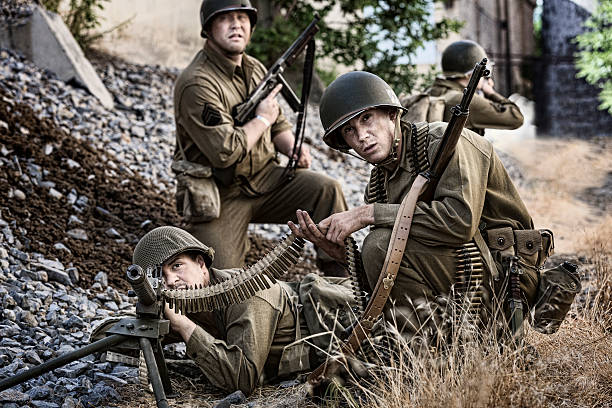 istock WWII Soldier Preparing to Take Out Enemy with Machine Gun 482139180
