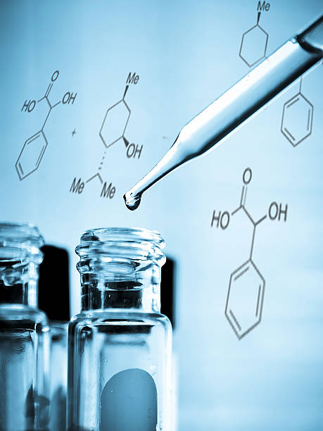 istock Dropping liquid to test tube 482139434