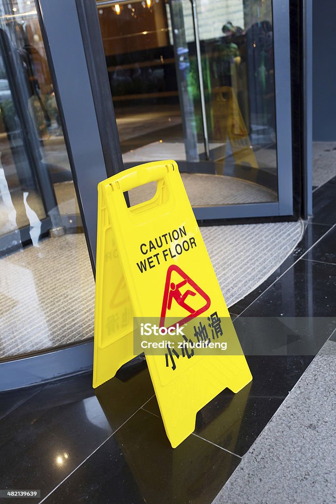 Sign showing warning of caution wet floor Care Stock Photo