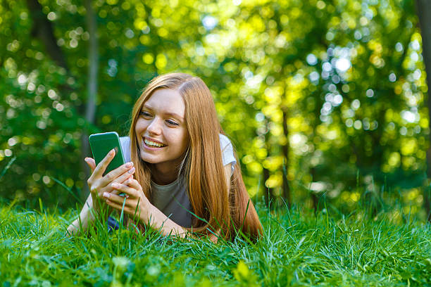 istock Beautiful smiling red-haired young woman 482141486