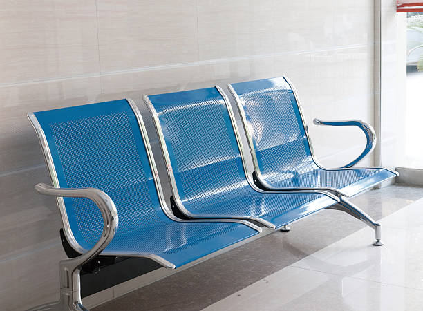istock waiting room blue chairs, door on the floor 482142128