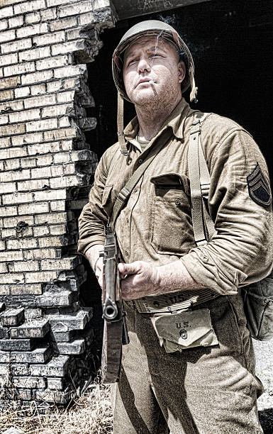 istock Army Sargeant Smokes a Cigarette While on Patrol 482143050