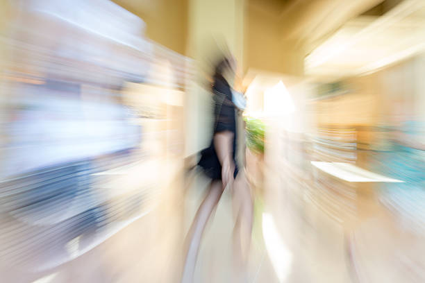 istock Pedestrians walking, zooming motion blur 482145394