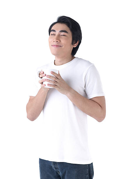 istock young man happy with coffee smell 482146036