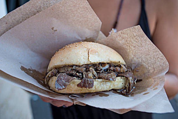 Pani ca' meusa (bread with spleen and lung) typical fast food dish from Palermo, Sicily. Italy.