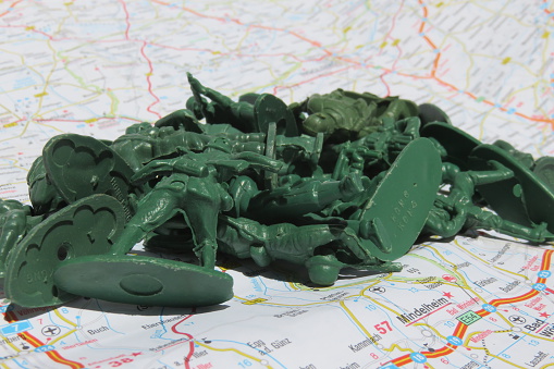 Toy Soldiers on paper map background