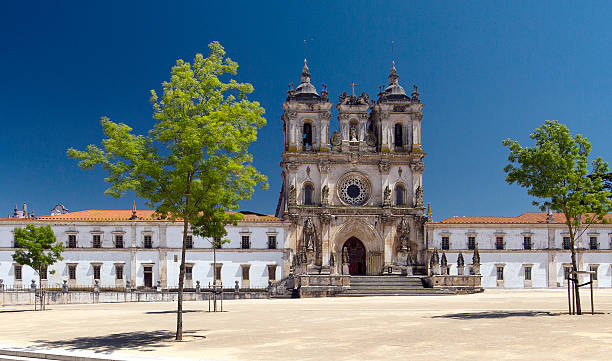 Monastery of Alcobaça, Portugal The Monastery of Santa Maria d'Alcobaça, north of Lisbon, was founded in the 12th century by King Alfonso I. Its size, the purity of its architectural style, the beauty of the materials and the care with which it was built make this a masterpiece of Cistercian Gothic art. alcobaca photos stock pictures, royalty-free photos & images