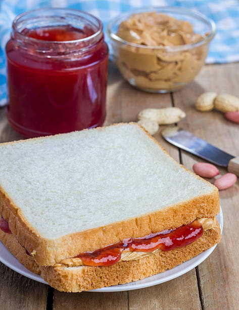 istock Sandwich with creamy peanut butter and strawberry jam 482151568