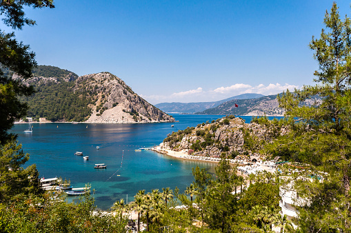 Visit beautiful Turunç on the Aegean Coast of Turkey for your holiday.  This pretty village is surrounded by pine covered mountains, which seem to tumble from high into the turquoise sea.  