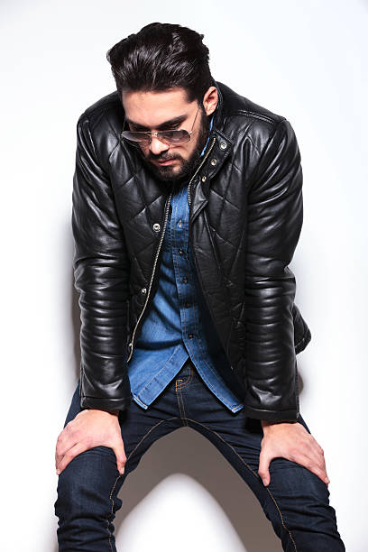 istock fashion man resting and looking down 482155085
