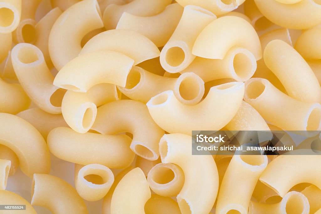 Macaroni pasta close up isolated on white 2015 Stock Photo