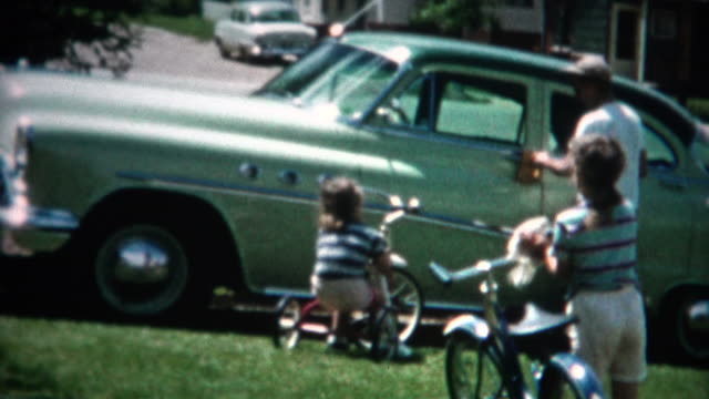 (8mm Film) Family Cleaning Vehicles in Yard 1956