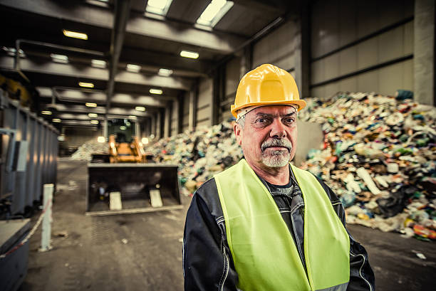 istock Portrait of the worker at the garbage dump 482167162