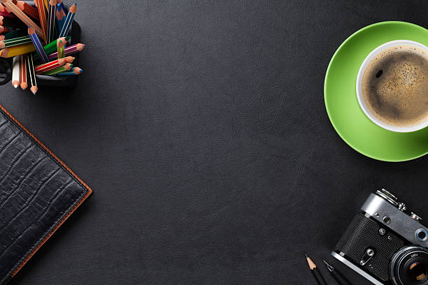 istock Office desk table with coffee cup, camera and supplies 482169484