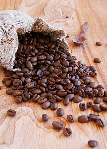 istock linen bag with coffee beans, a spoon and oriental teapot 482170958