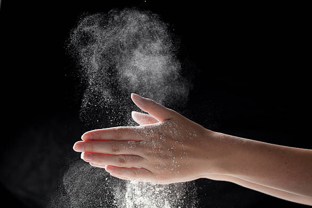 istock woman coating her hands in powder chalk magnesium 482177180