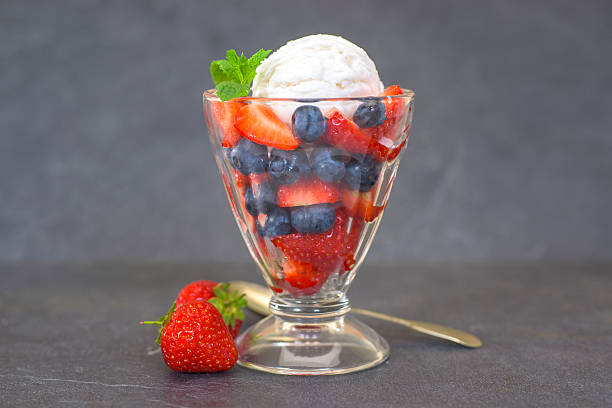 istock ice cream with blueberries and strawberries 482180170