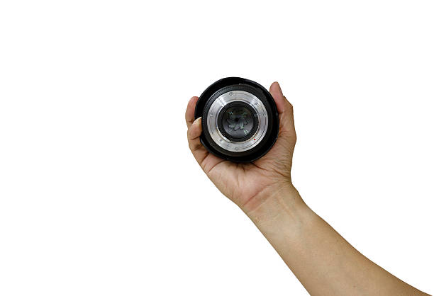 istock man hand holding lens black and white tone. 482181056