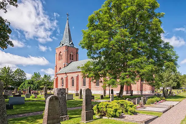 A red brick church in the Swedish town of Rya.