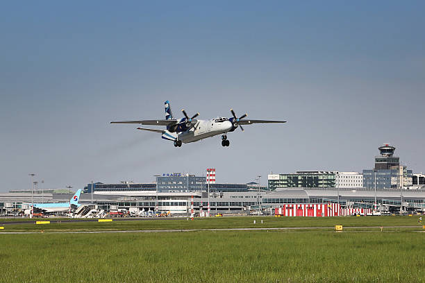 Volcano Air Prague, Czech Republic - May 13, 2015: Vulkan Air Antonov An-26B takes off from PRG Airport. antonov an 26 stock pictures, royalty-free photos & images