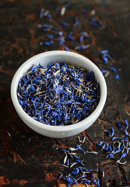 istock dried flowers cornflowers in a white bowl on a vintage  surface 482199558