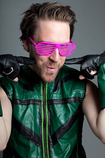 istock caucasian man disguised as super hero isolated on grey 482207467