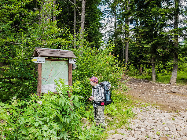 istock Young tourist near scheme mountain routes 482209330
