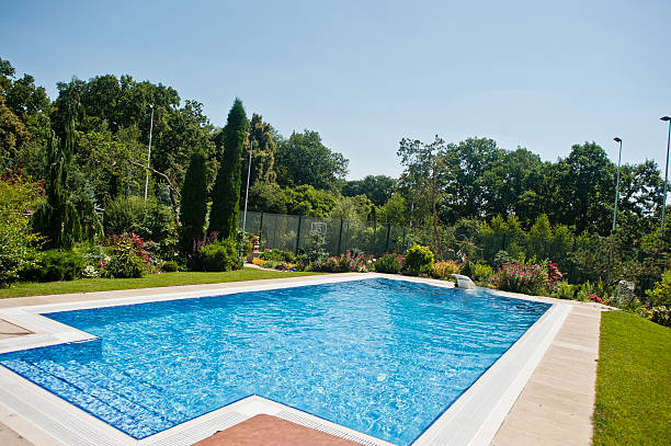 istock Blue pool outdoor at sunny day 482209428