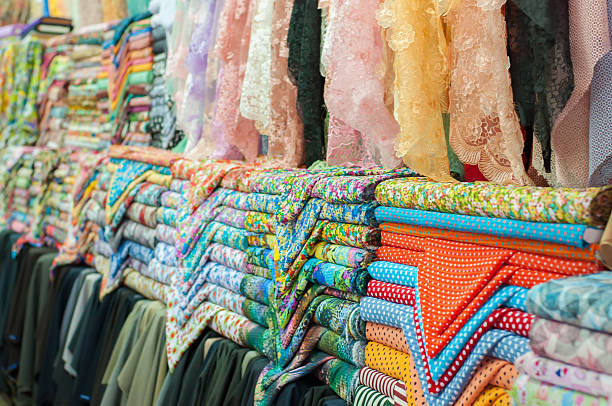 istock Colorful fabric rolls in the street 482211772