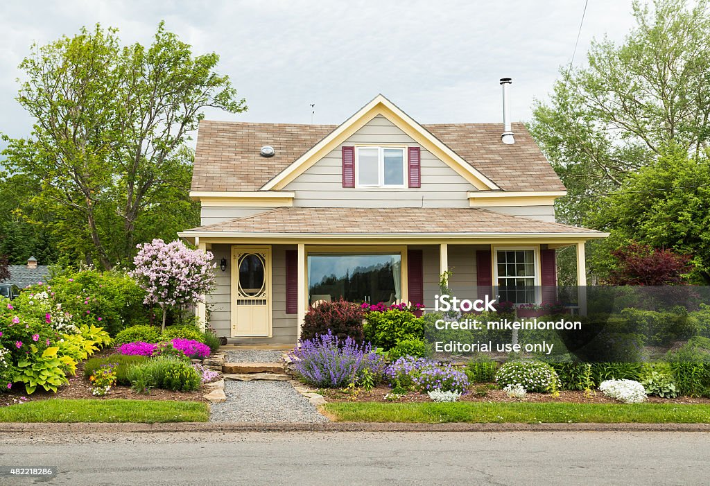 House in Baddeck, Nova Scotia Baddeck, Canada - July 5, 2015: The outside of a house in Baddeck showing the style and design House Stock Photo