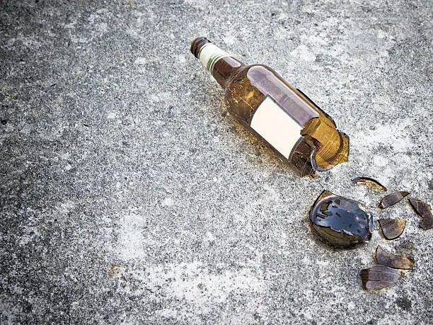 Photo of Shattered brown beer bottle