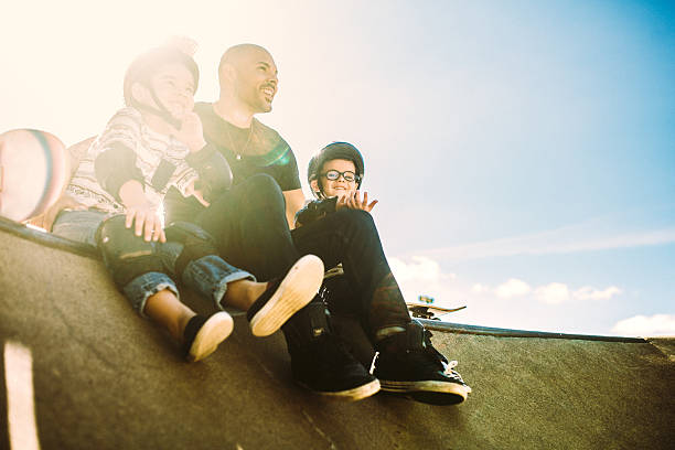 istock Father and Sons at Skate Park 482233996