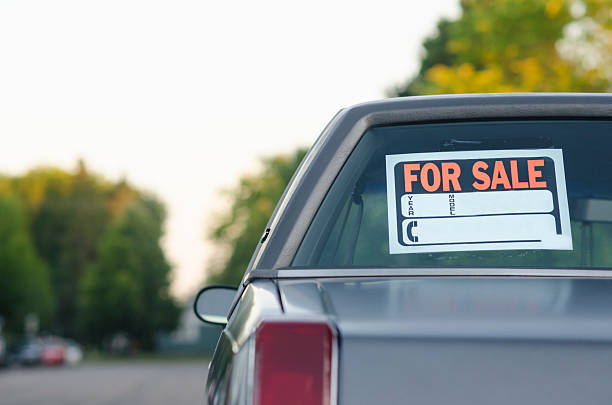 Car For Sale on Suburban Street Parked vehicle for sale on a street, with space for own text. car for sale stock pictures, royalty-free photos & images