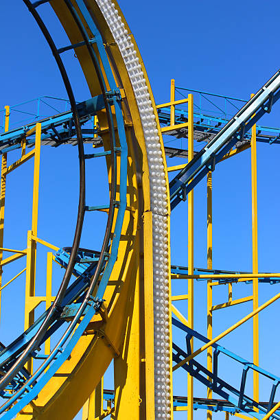 istock Image of rollercoaster ride at theme park, blue sky background 482236728