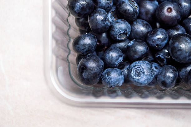 istock Overhead view of Blueberries in a Plastic Punnet 482242056