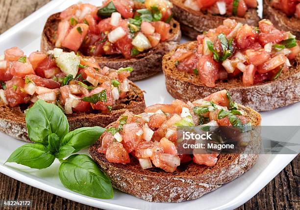 Plate Of Bruschettas Stock Photo - Download Image Now - 2015, Antipasto, Appetizer