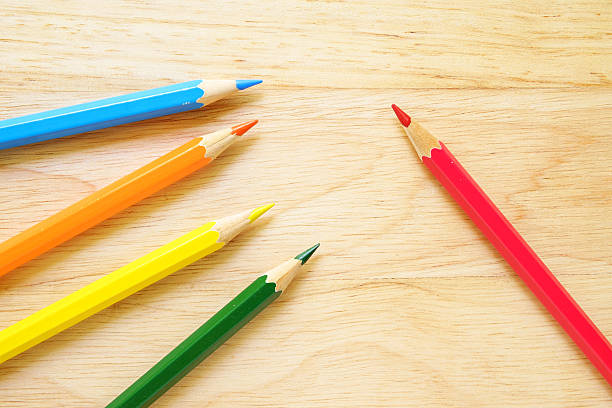 istock Color pencils on wood background 482248022